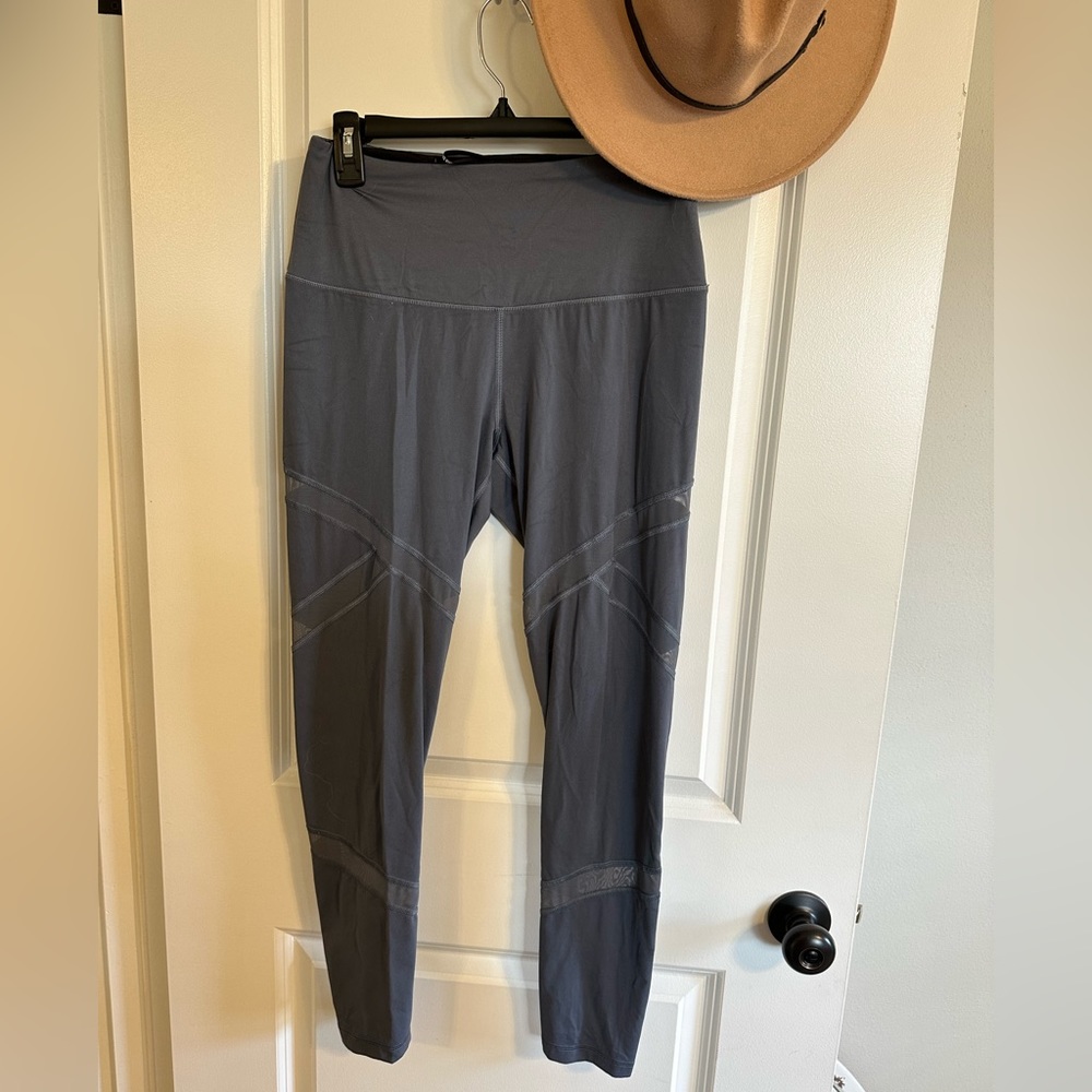 Victoria’s Secret leggings, size M. Grey